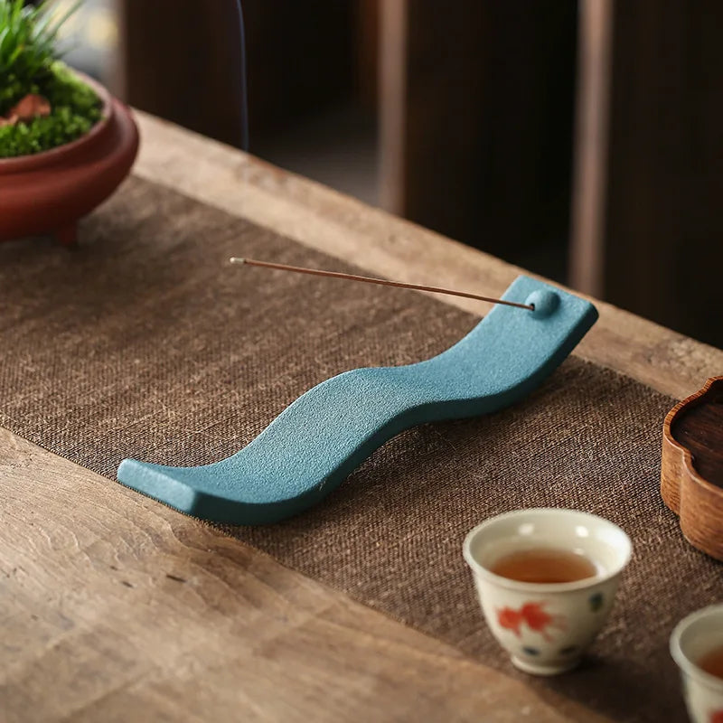 ZenWave – Elegant Ceramic Incense Holder with a Calming Wave Design
