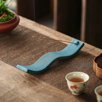 ZenWave – Elegant Ceramic Incense Holder with a Calming Wave Design