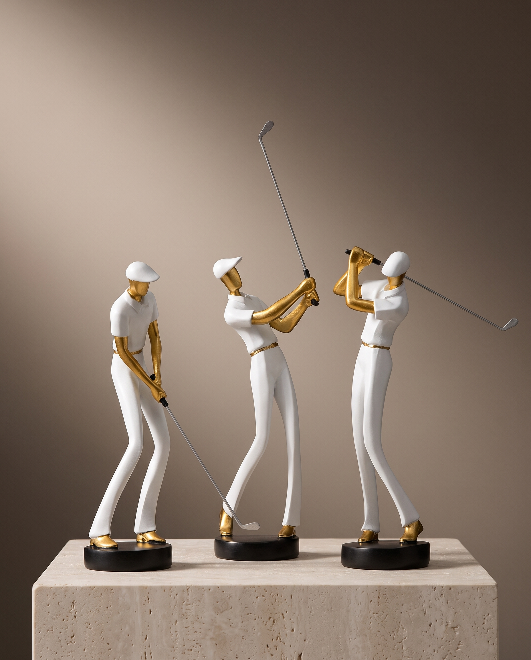 Gilded Motion golf figurines minimalist luxury hero shot