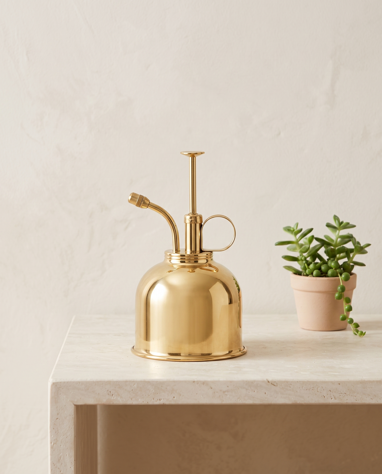 GoldenMist plant sprayer minimalist luxury hero shot