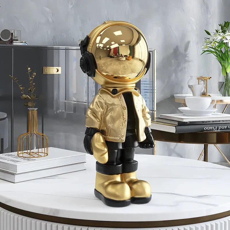 CosmoLuxe – Exquisite Astronaut Statue with Gleaming Gold Accents