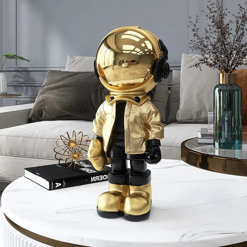 CosmoLuxe – Exquisite Astronaut Statue with Gleaming Gold Accents