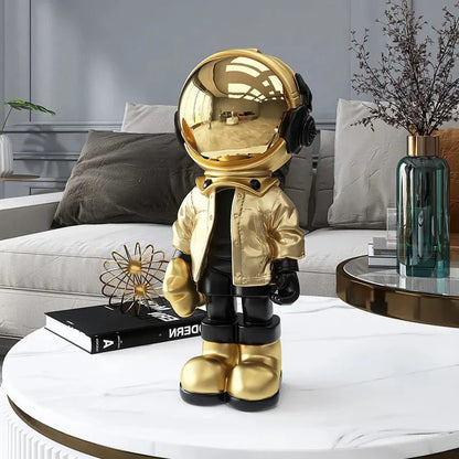 CosmoLuxe – Exquisite Astronaut Statue with Gleaming Gold Accents