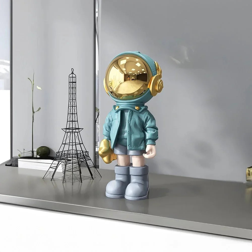 CosmoLuxe – Exquisite Astronaut Statue with Gleaming Gold Accents