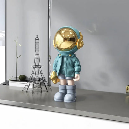 CosmoLuxe – Exquisite Astronaut Statue with Gleaming Gold Accents