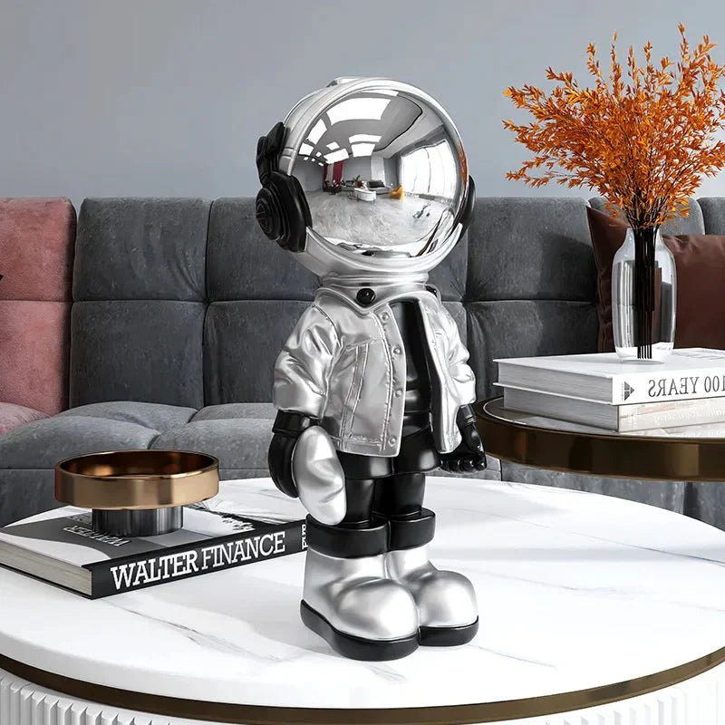 CosmoLuxe – Exquisite Astronaut Statue with Gleaming Gold Accents