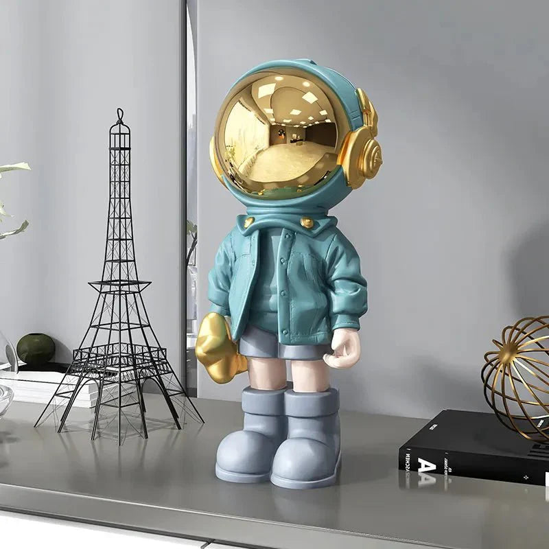 CosmoLuxe – Exquisite Astronaut Statue with Gleaming Gold Accents