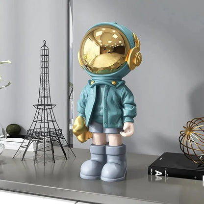 CosmoLuxe – Exquisite Astronaut Statue with Gleaming Gold Accents
