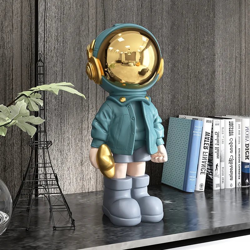 CosmoLuxe – Exquisite Astronaut Statue with Gleaming Gold Accents